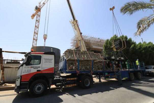 brogan scaffolding logistics, truck moving scaffolding parts